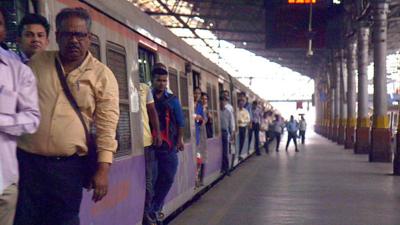 Passengers arrive at a railway station