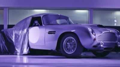 Aston Martin DB4 being unveiled.