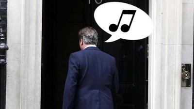 David Cameron with music note in speech bubble drawn over his head