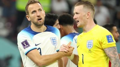 Harry Kane and Jordan Pickford of England