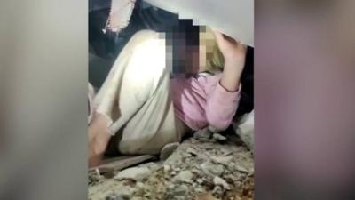 Girl rescued from rubble