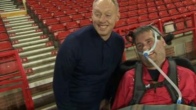 Nottingham Forest boss Steve Cooper and Reds fans Sam Perkins