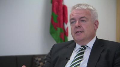 Carwyn Jones sitting down