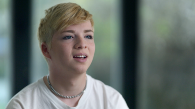 Teenager wearing a white t-shirt