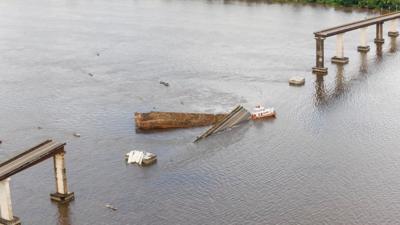 A bridge over the Moju River is seen after collapsing in Acara, Para state