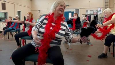 Woman dancing in chair