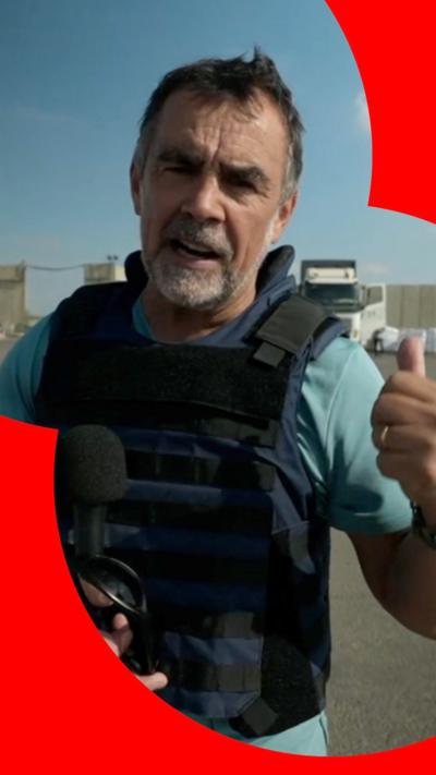 Wyre Davies in a security vest