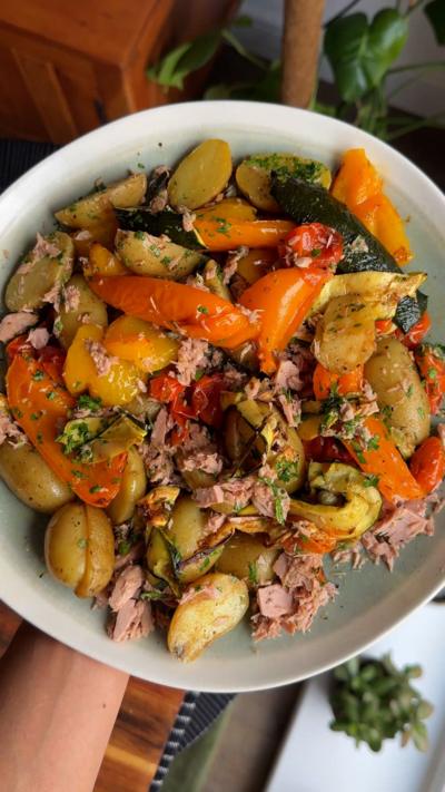 Tuna potato salad on a white plate from above