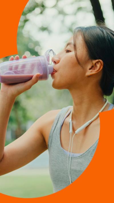 Woman drinking protein shake 