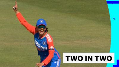 Indian cricketer celebrating 