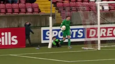 Watch: Goalkeeper and ball boy incident at Solitude BBC Sport