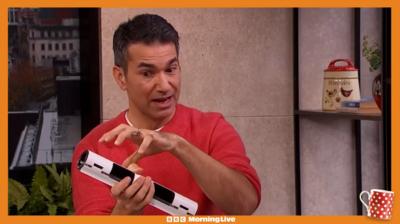 Wayne Perrey holding a Euro cylinder 