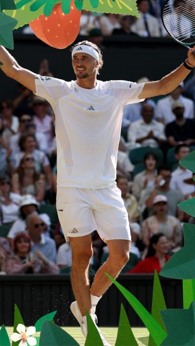 Alexander Zverev raises his arms up in the air 