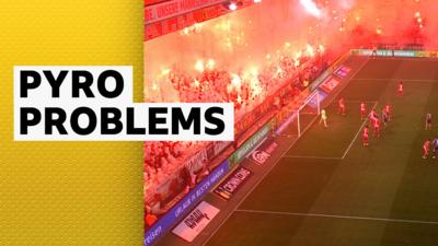 Union Berlin fans with flares