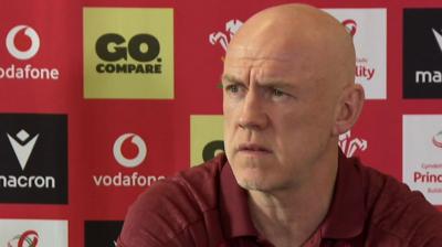 Steve Tandey speaks to the media