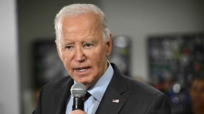 Biden is seen speaking to a crowd.