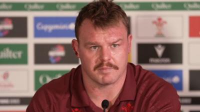 Dewi Lake speaks to the media