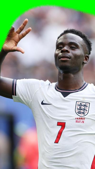 Bukayo Saka holds up three fingers to celebrate a hat-trick for England against France in the 2026 World Cup third place final.