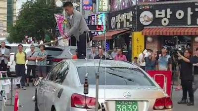 Man smashes car