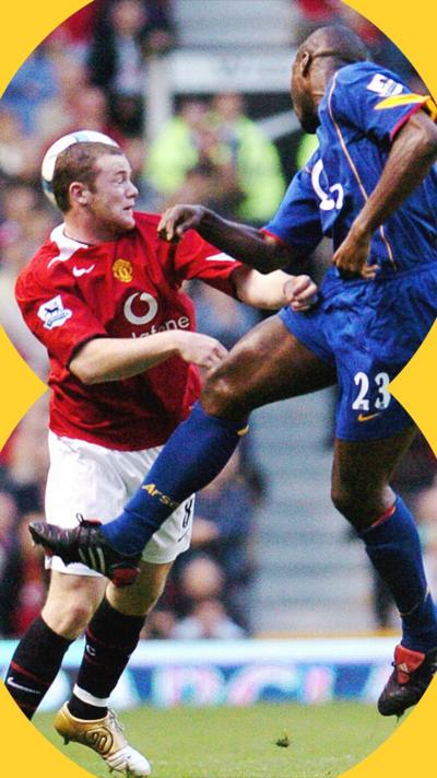 Manchester United's Wayne Rooney (L) fights for the ball with Arsenal's Sol Campbell during their Premiership League football match at Old Trafford, Manchester, United Kingdom, 24 October 2004.
