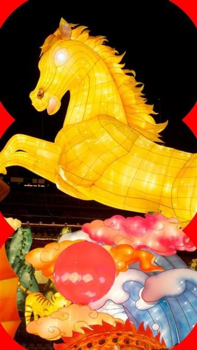 A yellow lantern in the shape of a horse