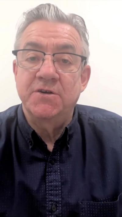 John McTernan wears a black shirt
