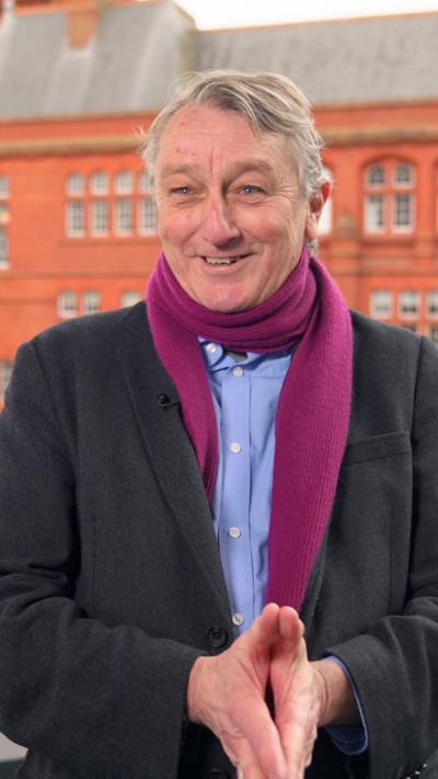 Anthony Slaughter in a purple scarf