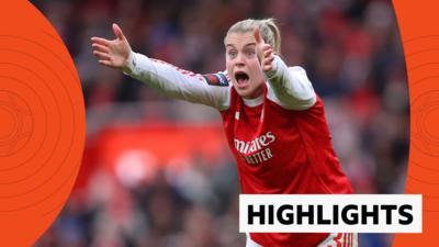 Alessia Russo holds her arms out in frustration in red Arsenal kit