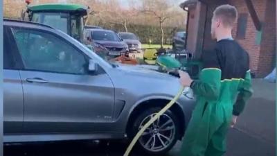 Marco Stiepermann cleaning a car