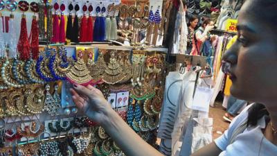 Woman looking at jewellery