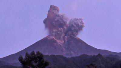 Lava and clouds of ash spew from Mount Merapi