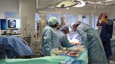 Surgeons in an operating theatre