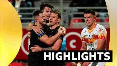 Hull FC players celebrate a try at Catalans Dragons