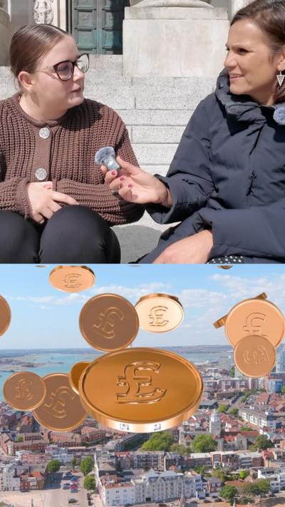 two women sat talking and money falling