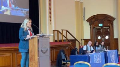 Student speaking at mock climate change event at Belfast City Hall