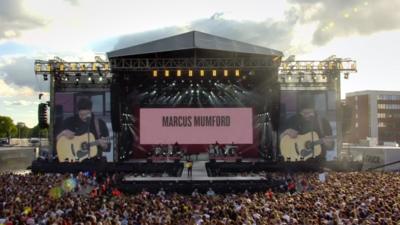 Marcus Mumford leads a minute silence at the One Love concert