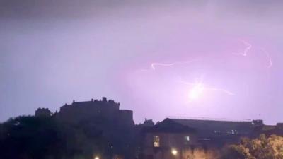 Lightning flashes over Edinburgh Castle