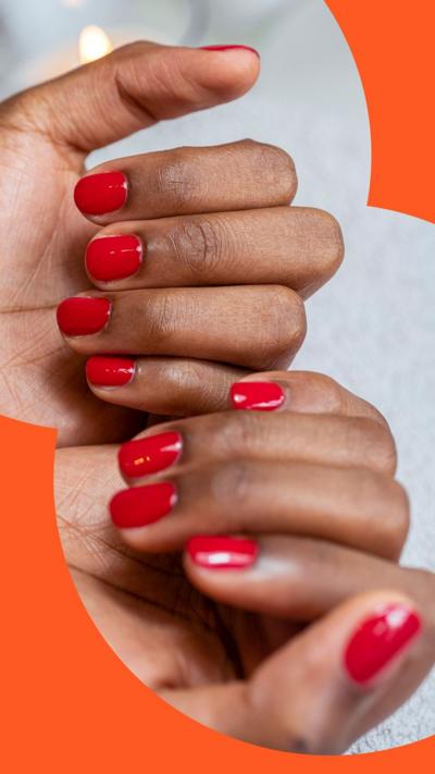 Two hands with red nail varnish 