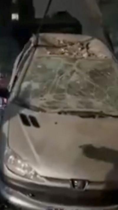 A damaged car being winched