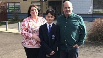 Jack Thompson and his parents