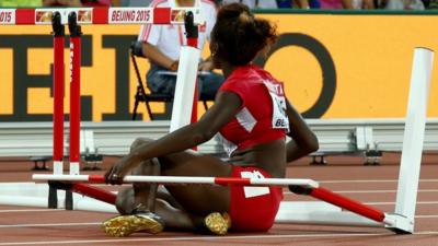 Dawn Harper-Nelson fell at the second hurdle in her 100m hurdles semi-final at the World Championships