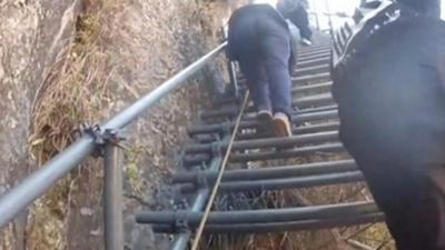 Metal stair up a cliff in China