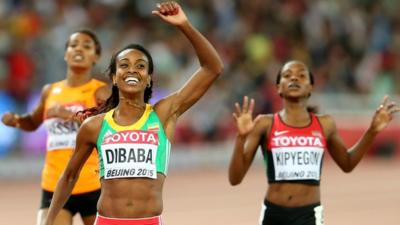 Genzebe Dibaba celebrates taking gold in the 1500m in Beijing
