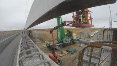 Bridge beam moved into position