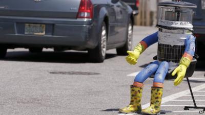 File picture of robot, HitchBOT, thumbing a lift in Marblehead, Massachusetts