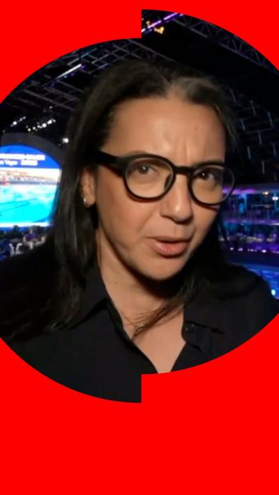 BBC Correspondent Shaimaa Khalil reporting from the Enhanced Games. She has long dark hair and wears black-rimmed glasses.