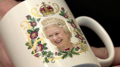 Mug with Queen's face on it