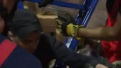 Factory worker rescued