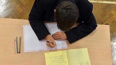 A schoolboy in a classroom