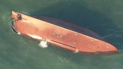 Capsized boat in English Channel